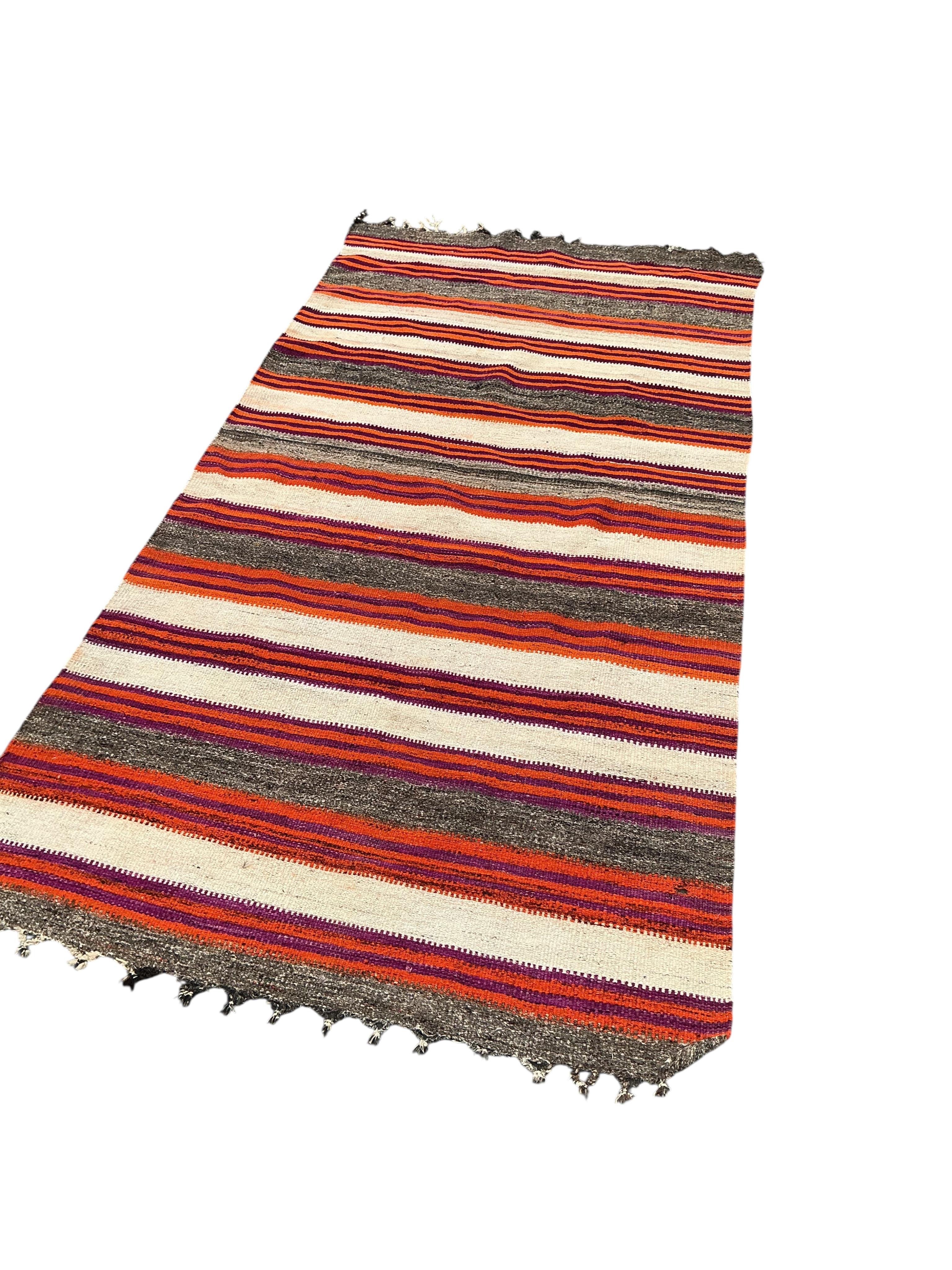 A Turkish kilim carpet, 280 x 140cm